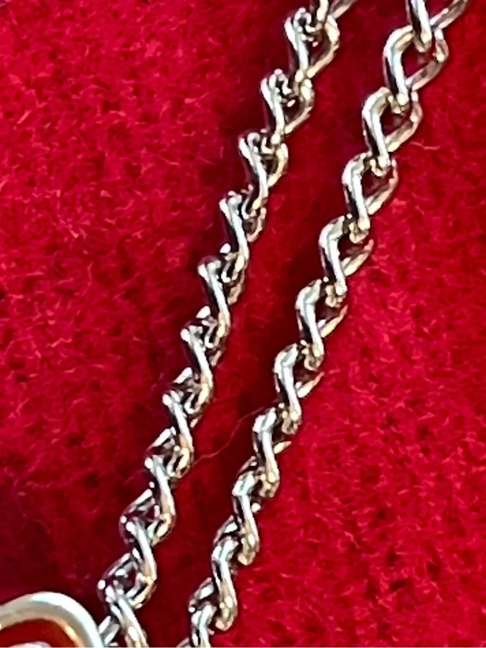 Minnie Mouse shaker charm on silver chain.